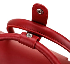 Close view of the button closure of the hand-carry straps